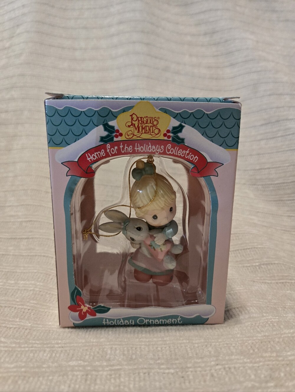 Precious Moments Girl Holding Bunny Ornament in Pink and Blue